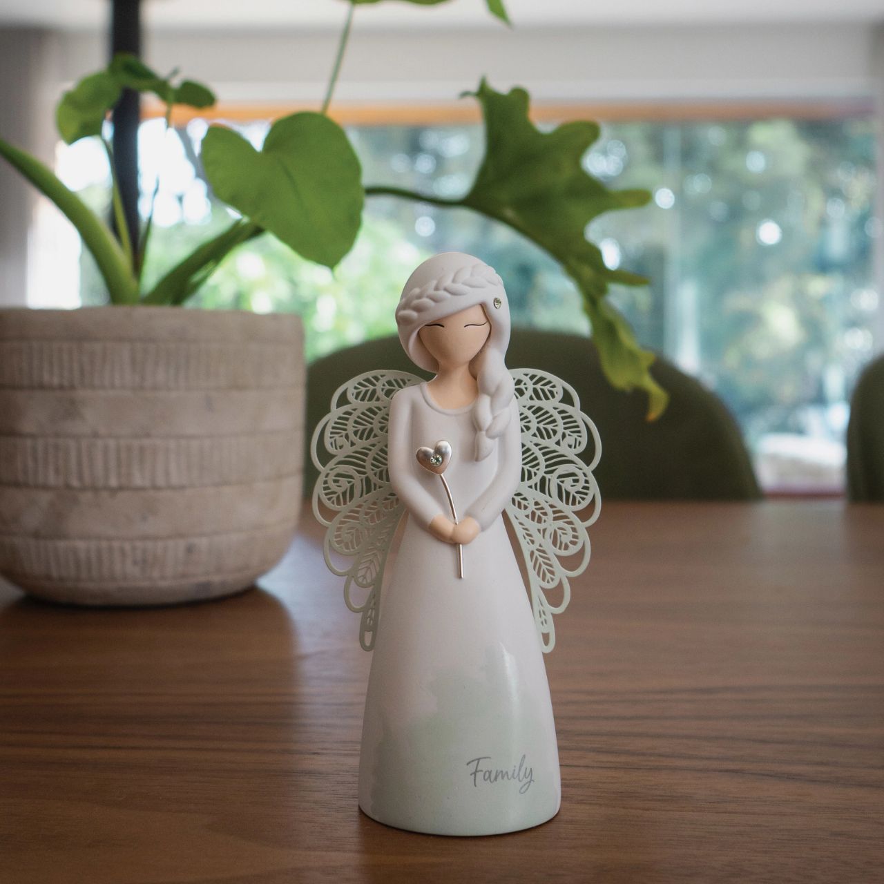 Thank You Angel Figurine - Family  Looking for a thoughtful gift that's both beautiful and meaningful? These stunning angels are the perfect way to show someone special just how much they mean to you. Standing 12.5cm tall, they are perfect as a gift and home decoration.