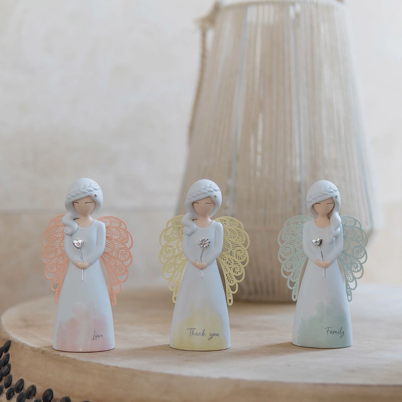 Thank You Angel Figurine - Family  Looking for a thoughtful gift that's both beautiful and meaningful? These stunning angels are the perfect way to show someone special just how much they mean to you. Standing 12.5cm tall, they are perfect as a gift and home decoration.