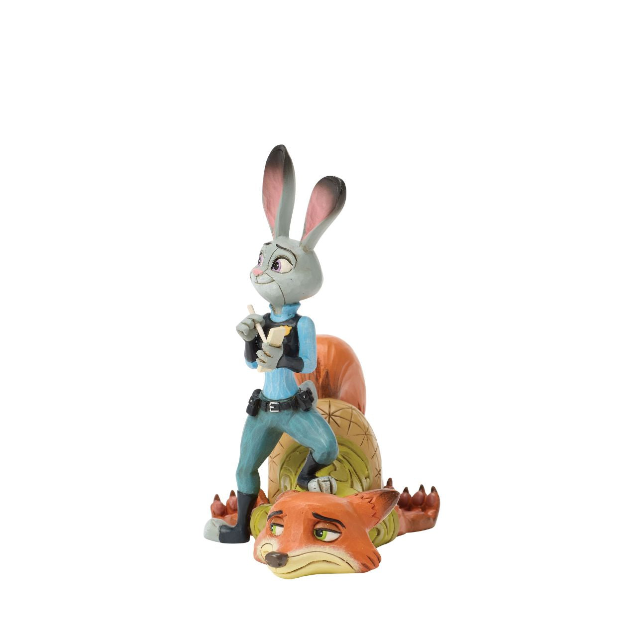 From Zootopia, Judy Hopps and Nick Wilde share a moment of playful teamwork in this Jim Shore reimagining. With bright folk art patterns and colourful detail, it celebrates friendship and playfulness. Judy stands ready to take notes, on top of Nick.