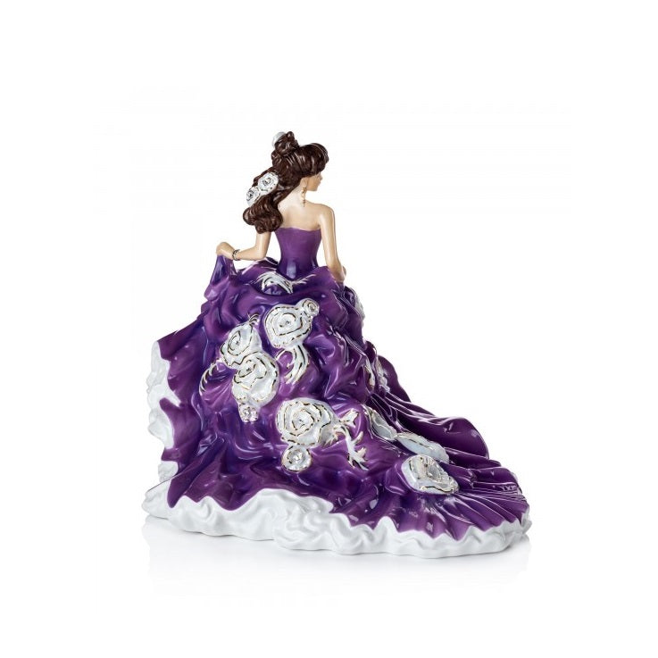 English Ladies Company Amethyst Enchantment  Amethyst Enchantment is our brand new figurine to our English Ladies Co range. Designed and modelled by Valerie Annand, our master painter Dan Smith has created this wonderful colourway. Her rich purple dress is decorated with Mother of Pearl highlights and 24 real Swarowski® crystals, she really is a beauty.