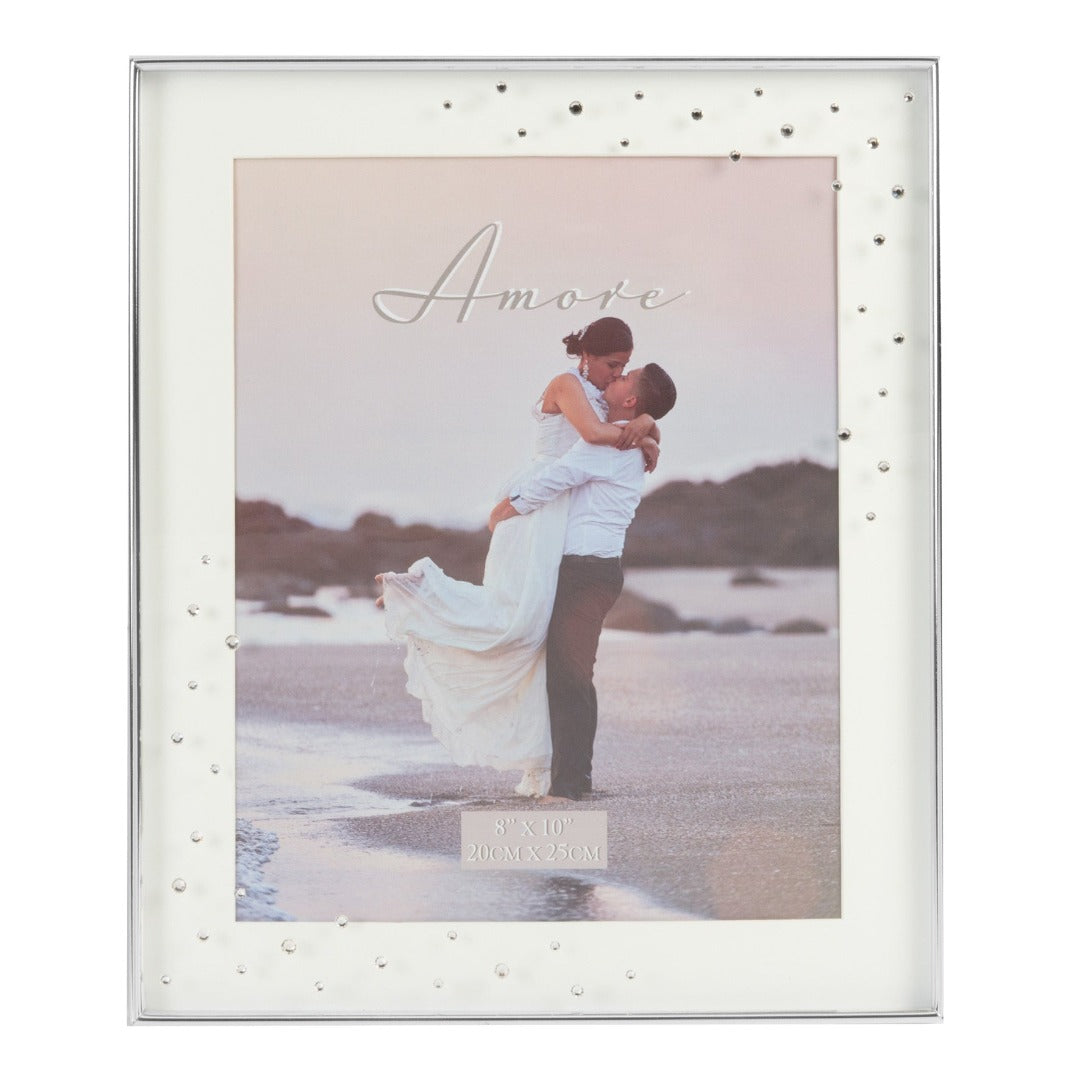 Amore Silver Plated Box Frame with Crystals 8" x 10"  A beautiful silver plated box frame with 8" x 10" (20 x 25 cm) aperture from the AMORE BY JULIANA® Wedding Day Collection. The frame features a crisp white mount and the glass is embellished with a spray of crystals. Complete with standing strut.