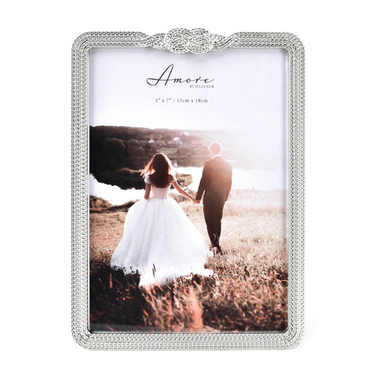 Amore Silver-Plated Infinity 3D Knot Photo Frame - 5" X 7"  Taking its name from the Italian for love, AMORE BY JULIANA® combines the romance and elegance of Italian style in fresh, contemporary and timeless designs with real sentimental value.