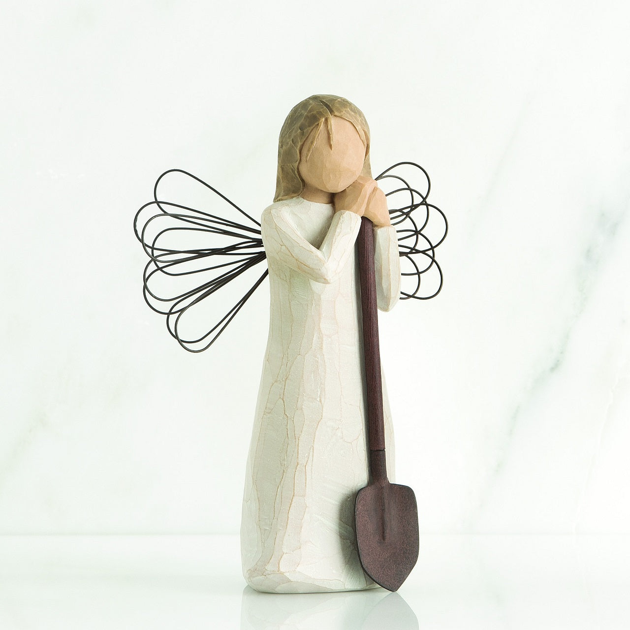 Willow Tree Angel of the Garden  Willow Tree is an intimate line of figurative sculptures representing sentiments of love, closeness, healing, courage, hope...all the emotions we encounter in life. Artist Susan Lordi hand carves the original of each Willow Tree sculpture.