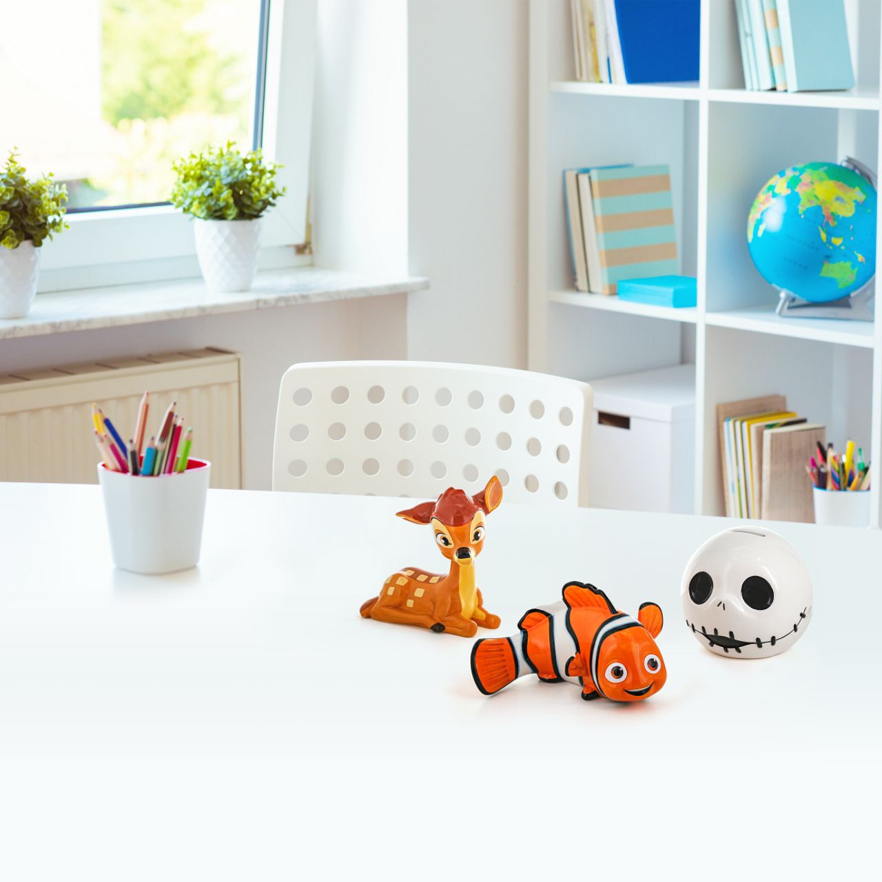 Enchanting Disney Collection The Young Prince Bambi Money Bank  Featured here is Bambi as a fawn, with his iconic orange fur coat, wheat spots and brown stripe that ran from his head down to his tail. The Young Prince sculpted ceramic money bank is perfect for any Disney fan wishing to save their pennies.