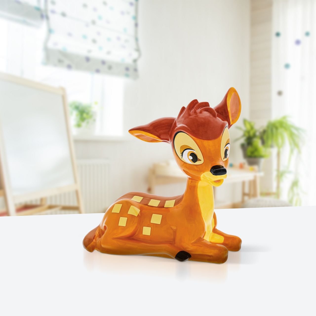Enchanting Disney Collection The Young Prince Bambi Money Bank  Featured here is Bambi as a fawn, with his iconic orange fur coat, wheat spots and brown stripe that ran from his head down to his tail. The Young Prince sculpted ceramic money bank is perfect for any Disney fan wishing to save their pennies.