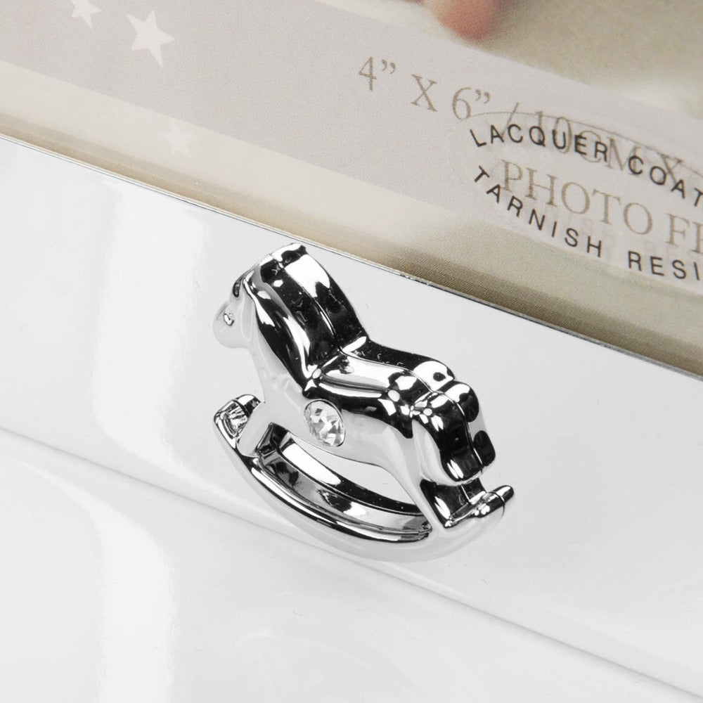 Bambino Keepsake Double Photo Frame 4" x 6"  A double folding 4" x 6" (10x15cm) silver plated photo frame from BAMBINO BY JULIANA®. Complete with crystal set pram and rocking horse icons and luxury gift box. A wonderful engravable new baby or Christening gift.