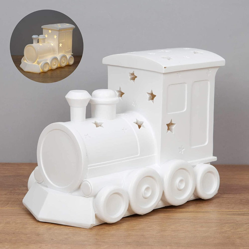 Bambino Light Up Night Light Train  Keep those nightmares at bay and maintain a soothing atmosphere in their bedroom or nursery with this cheerful battery powered train night light. From BAMBINO BY JULIANA® - keeping the earliest memories alive forever.