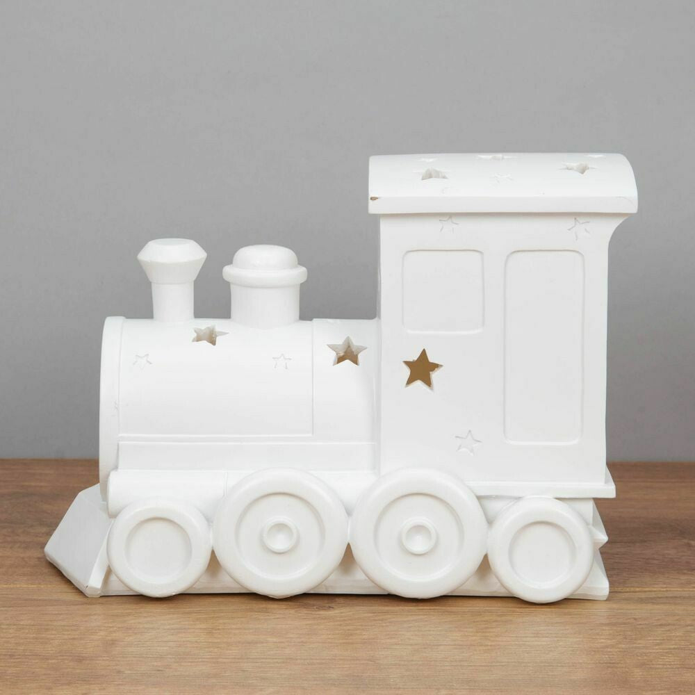 Bambino Light Up Night Light Train  Keep those nightmares at bay and maintain a soothing atmosphere in their bedroom or nursery with this cheerful battery powered train night light. From BAMBINO BY JULIANA® - keeping the earliest memories alive forever.