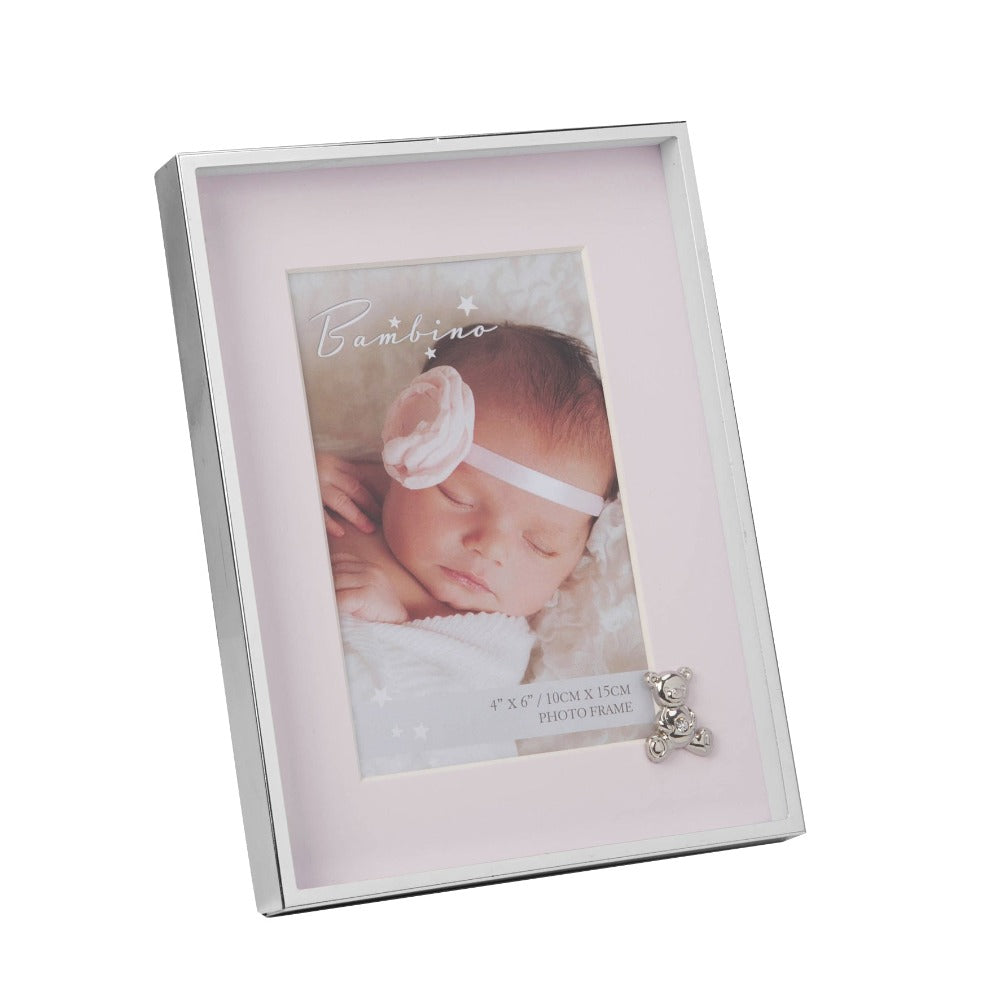 Bambino Silver Finish Frame - Teddy Pink Mount 4" x 6"  A gorgeous 4" x 6" (10 x 15 cm) nickel plated silver finish BAMBINO BY JULIANA® photo frame with a pink mount. The photo frame is embellished with a crystal finished silver teddy bear icon. Complete with a standing strut.