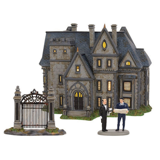 The Wayne Manor stands just over 8 inches tall and features light up windows. This set even includes a front as well as an Alfred and Bruce figurine set.