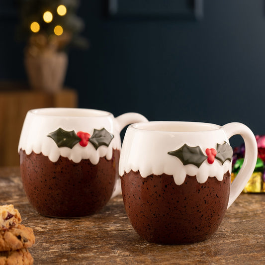 Belleek Living Christmas Pudding Mug Set of 2  Bring some fun to your table when you entertain this Christmas. Our novelty Christmas Pudding Tableware Collection includes a pair of mugs, covered pot with spoon and small jug, salt and pepper set and sweet jar.