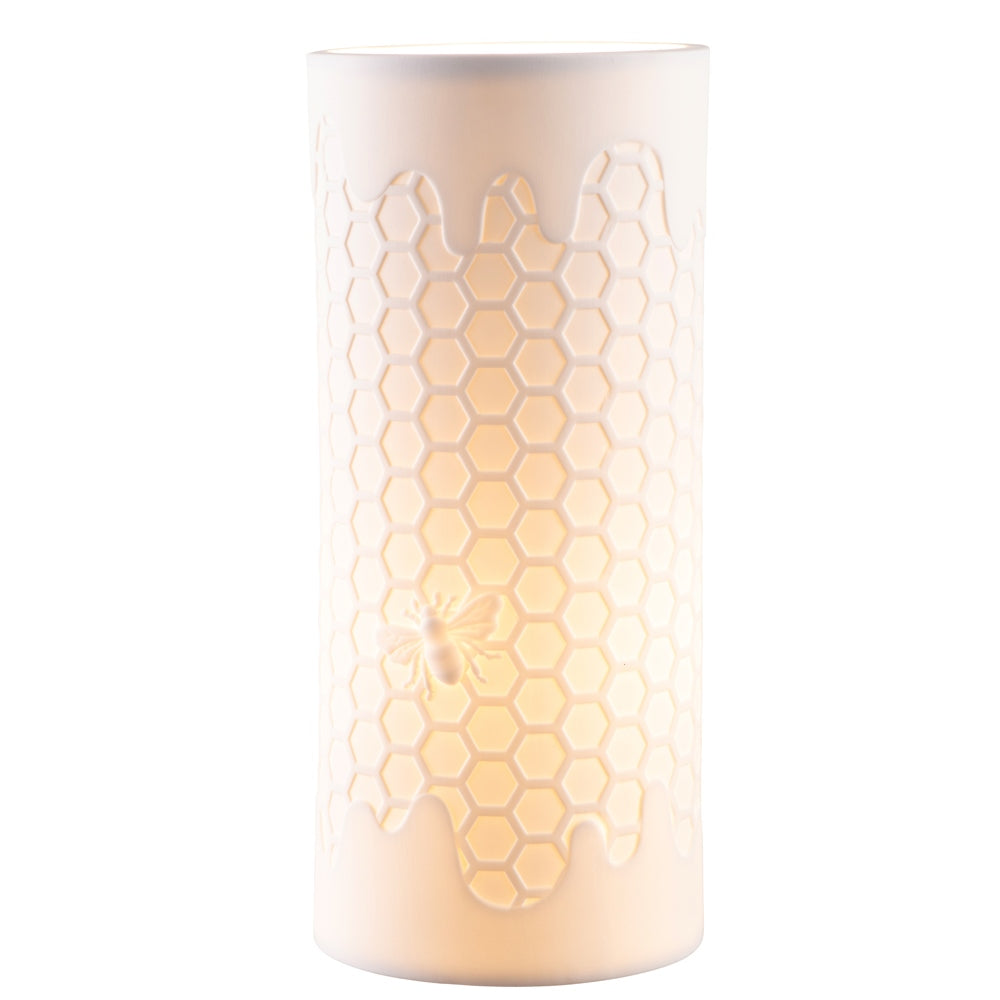 Honey Hive Luminaire by Belleek Living  The Honey Hive Luminaire features beautifully modelled details, with a hexagon hive pattern and a little embossed bee. Belleek Living Luminaire lamps emit a soft warm glow highlighting the delicate surface decoration, creating beautiful mood lighting for your home.