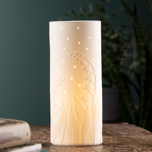Belleek Living Lily of the Valley Luminaire  Featuring exquisitely modelled motifs of the lily of the valley plant, this luminaire is timeless and elegant. Belleek Living Luminaire lamps emit a soft warm glow highlighting the delicate surface decoration and piercing, creating beautiful mood lighting for your home. Mains powered, light bulb included.