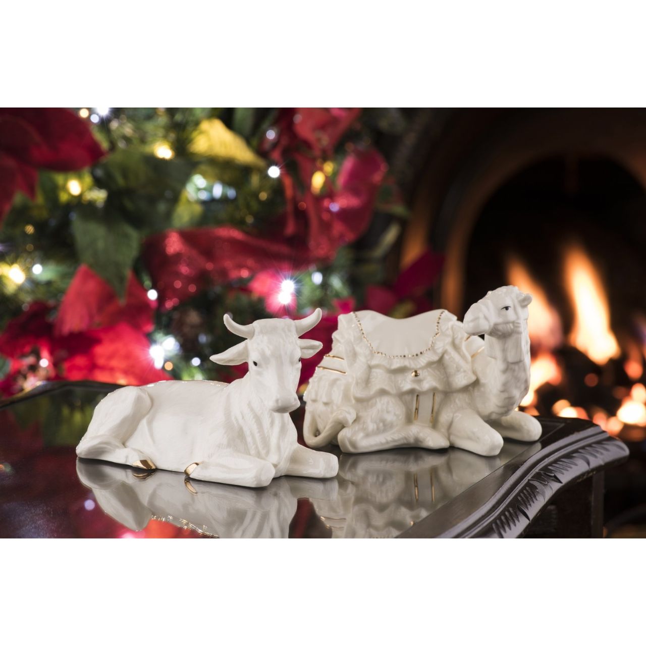Belleek Living Manger Set - Ox and Camel  For that very special time of year when you want to show how much you care, Belleek Living have designed an exclusive Christmas Collection, full of unique gift ideas. Whether it is surprising that special someone or adding a contemporary touch to your home, the Christmas Collection holds the perfect solution.