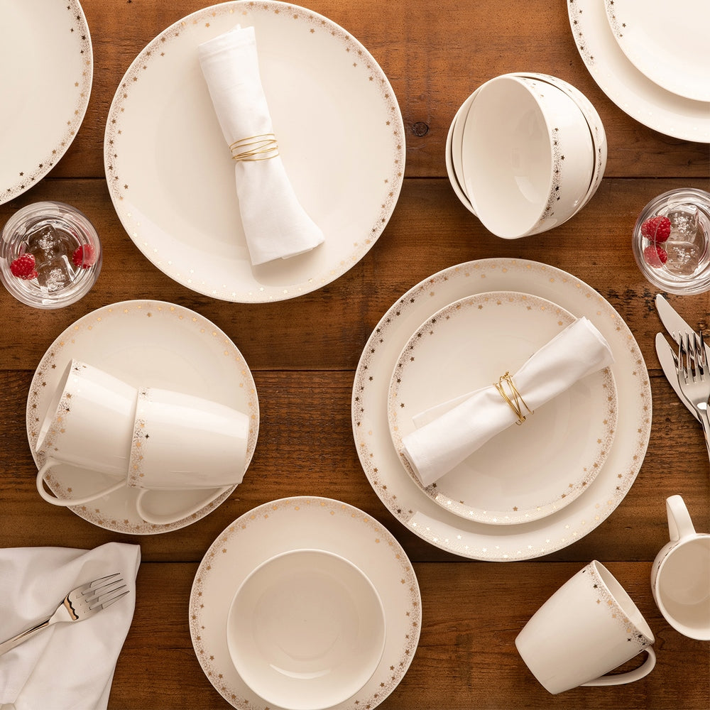 Belleek Living Stardust Set of 4 Mugs  Stardust set of 4 mugs feature a delicately stippled gold band with scattered gold accent stars adorning the edge.