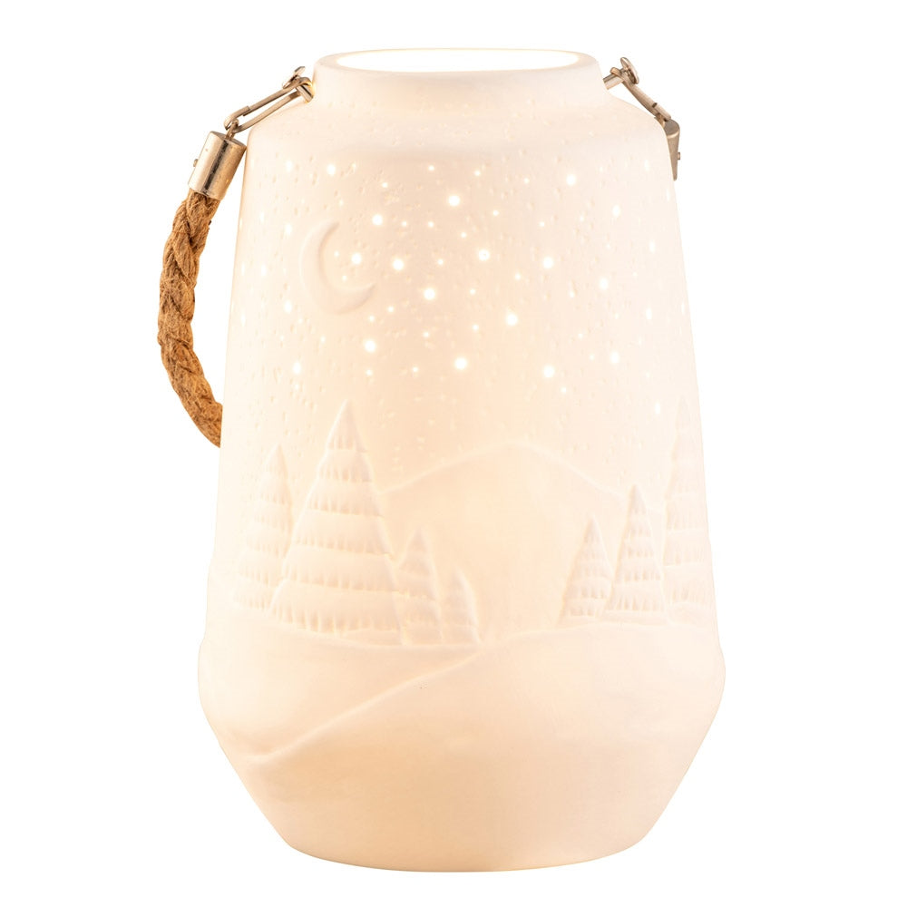 Winter Scene Luminaire by Belleek Living  Create a Winter Scene with this beautiful rope handled Winter Scene Luminaire. When lit the luminaire creates soft mood lighting to ensure a relaxed and peaceful atmosphere and displays a gorgeous winter starry night. 