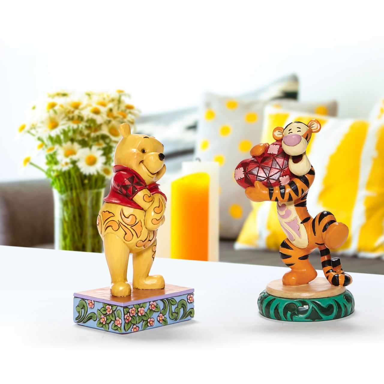 Jim Shore Beloved Bear Winnie the Pooh Personality Pose Figurine  Celebrating the 95th anniversary of the Winnie the Pooh book, this Silly Ol' Bear is happily smiling with his belly full of honey. Jim Shore's design captures the personality of the beloved Winnie the Pooh from the Hundred Acre Wood.