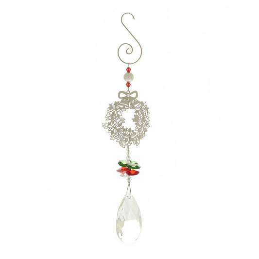 Christmas Crystal Metal Tree Hanging Decoration - Wreath  This crystal tree hanging decoration would be a beautiful addition to any tree this year. With a delicate wreath design, a crystal feature, and a gorgeous red gift box, this is sure to bring a smile to the faces of any friends or family this year.