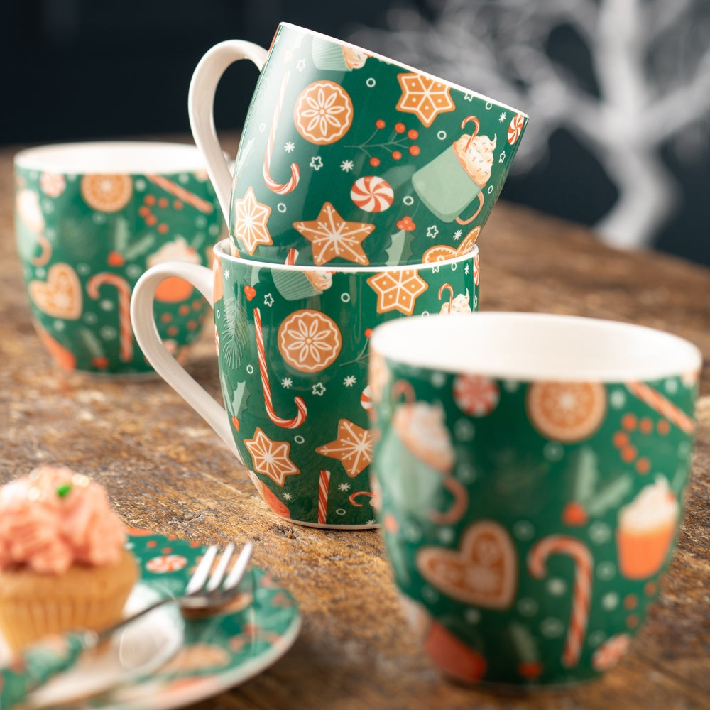 Christmas Cupcakes 4 Piece Mug Set by Belleek Living  This playful pattern has been inspired by Christmas time sweet treats. Featuring illustrations of cookies, cupcakes, hot chocolates and more in a vintage inspired colour palette, these mugs are sure to bring a smile to your face.