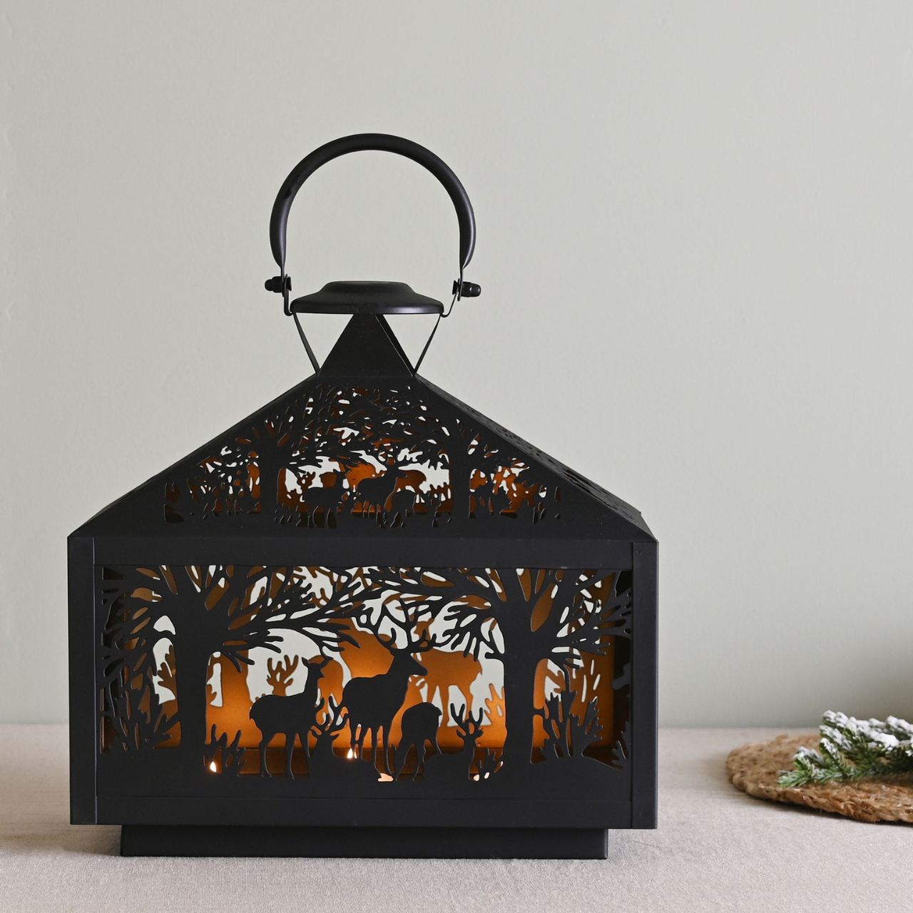 Stag Silhouette Christmas Lantern Rectangular  A rectangular stag silhouette lantern.  This enchanting lantern glistens with festive charm throughout the Christmas period.