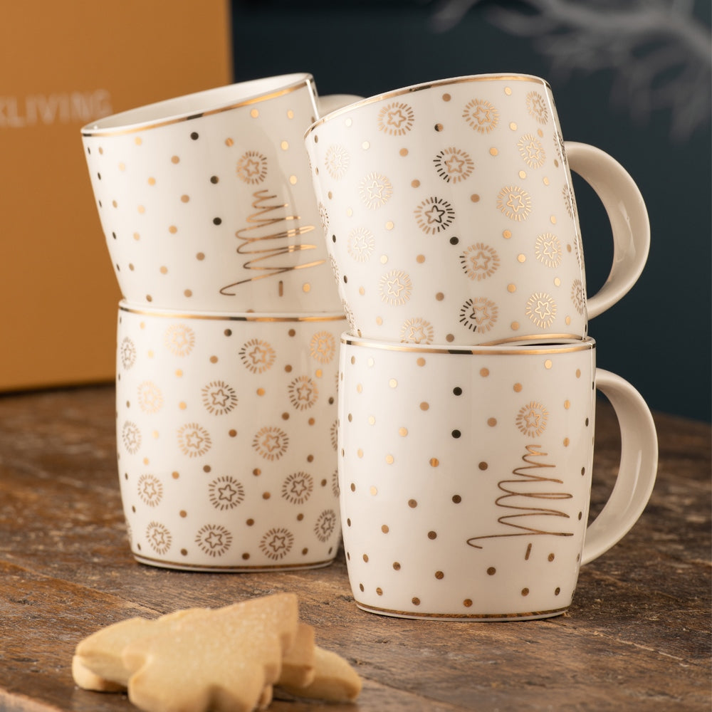 Christmas Merry & Bright 4 Piece Mug Set by Belleek Living  This simplistic yet striking mug set feature mix and match motifs of stars, Christmas trees and polka dots in exquisite real gold. Fun, yet timeless these mugs come beautifully boxed in a handmade box and make a great gift or an ideal touch of sparkle in your own home.