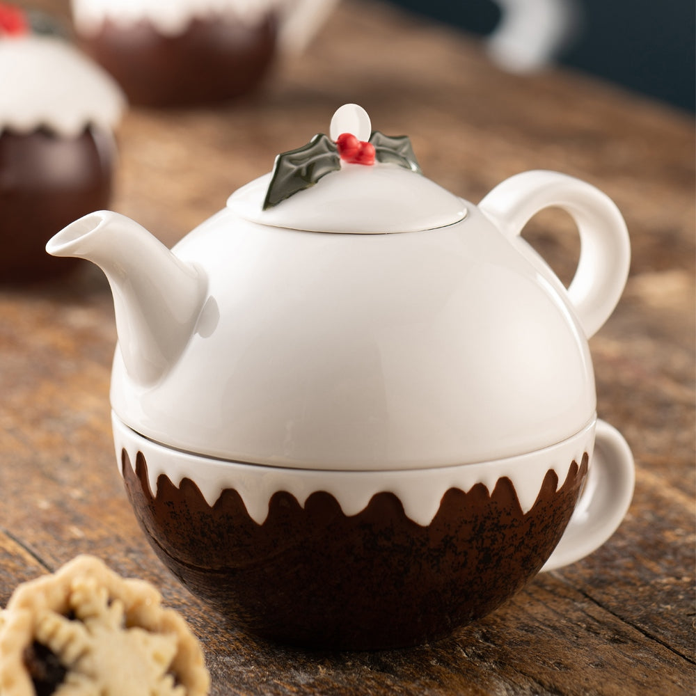 Christmas Pudding Tea for One by Belleek Living   Our fun Tea for One is a new addition to our Christmas Pudding Tableware Collection. The teapot sits neatly on top of the teacup, which has holly painted inside the base.