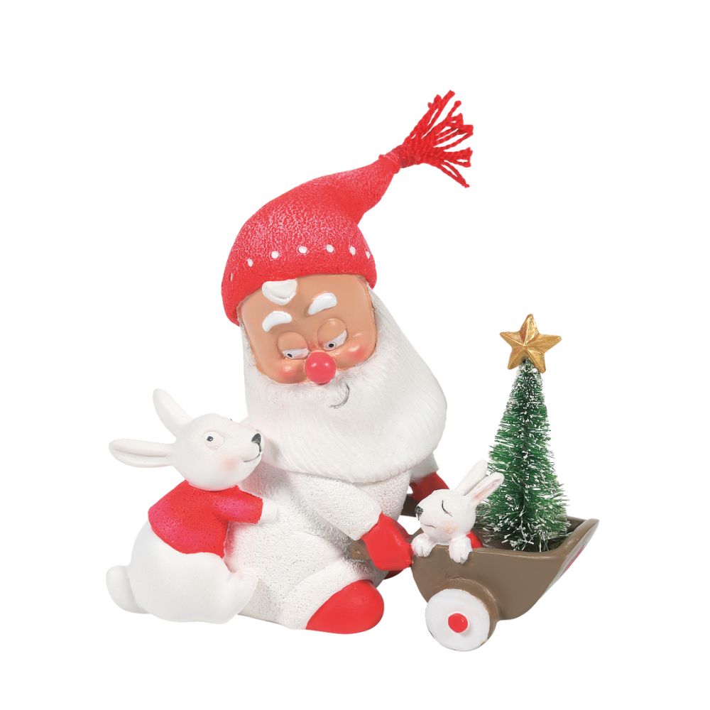 Department 56 Snowpinions Christmas Snow Gnome with Bunnies  Kindness is key when you're a Snow Gnome. This happy chap is helping his Bunny friends as he pushed his mini Christmas tree home. Each Snow Gnome has been hand crafted using high quality cast stone before being hand painted by our skilled artists.