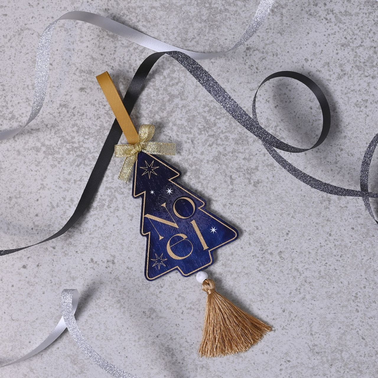 Christmas Tree Hanging Decoration Celestial  A celestial Christmas tree hanging decoration.  This celestial decoration take inspiration from the stars for standout display on the Christmas tree.