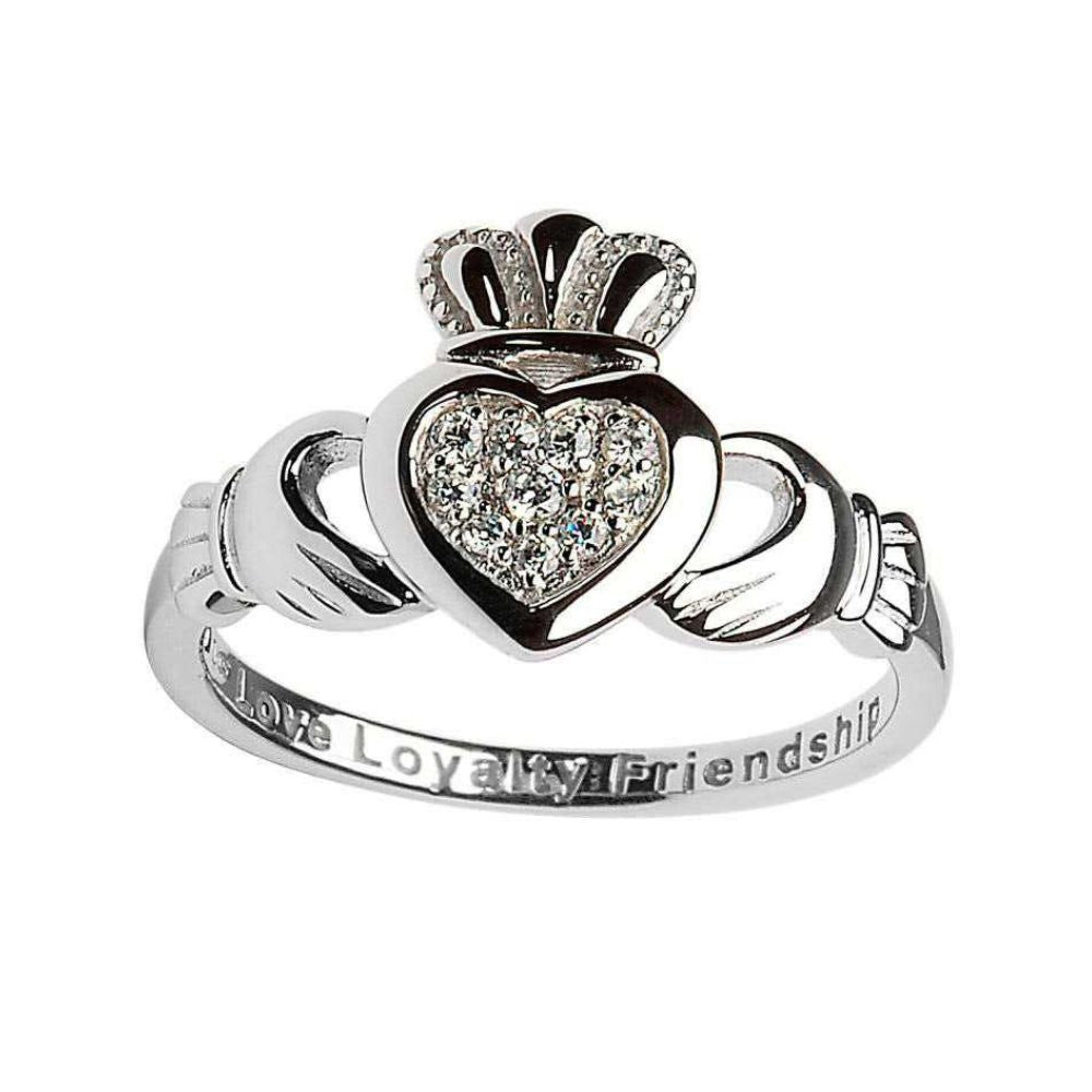 This exquisite ring is a fresh and mature take on the famous Celtic lover's band: the Claddagh Ring. Crafted delicately of Sterling silver, the ring is wonderfully detailed- from the cuffs around the hands to the patterns on the crown. But the true focus of the ring is rightly on the central heart. There ten brilliant CZ's are pave set in the heart itself to form a glorious focus for the ring.
