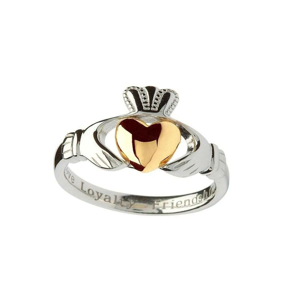 Sterling Sliver hands carefully clasp a 10 karat gold heart in this sophisticated rendition of the Claddagh. Exquisitely detailed, the ring contains the three components of the famous Irish symbol with a polished grace. Gleaming silver hands encircle the pool of flawless gold, each finger intricately etched into the silver. The crown of loyalty arches beautifully on top of the two. The inner ring engraved with the three words that encompass the Claddagh: Love, Loyalty, and friendship.