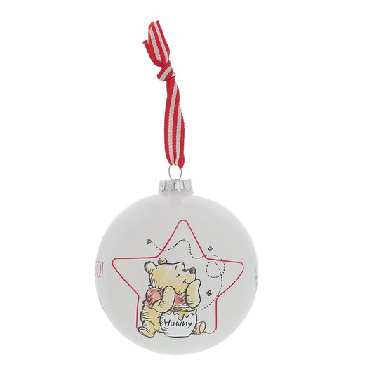 Christmas Bauble Disney Winnie The Pooh  Winnie the Pooh dreams about honey all day and this cute design shows that it is no exception at Christmas time. Sometimes the smallest things take up the most room in your heart and this glass bauble is the perfect example.