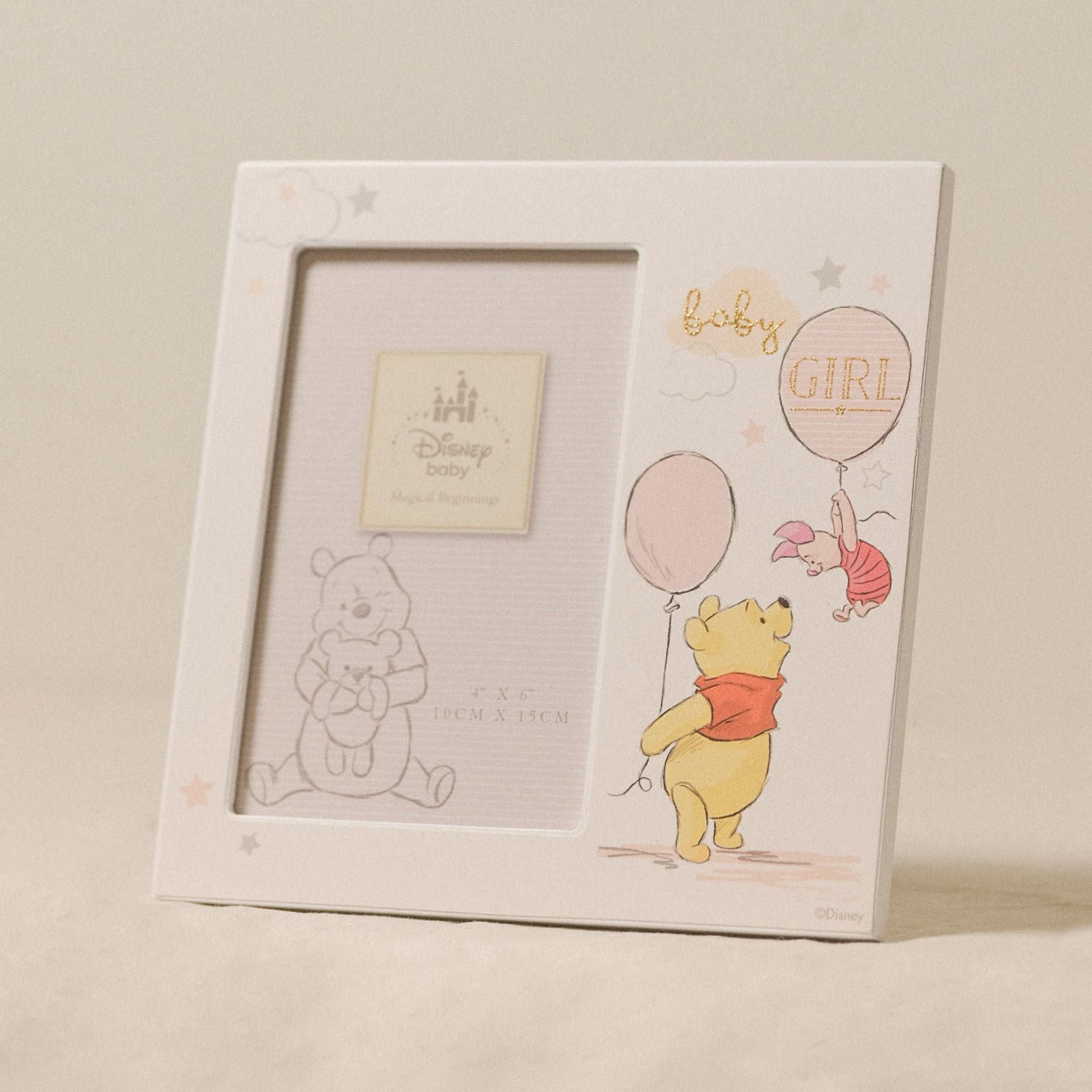 Disney Magical Beginnings Frame Pooh Baby Girl  Add a touch of Disney magic to their everyday with a wonderful Baby Girl frame from the Magical Beginnings Collection from Classic Disney.