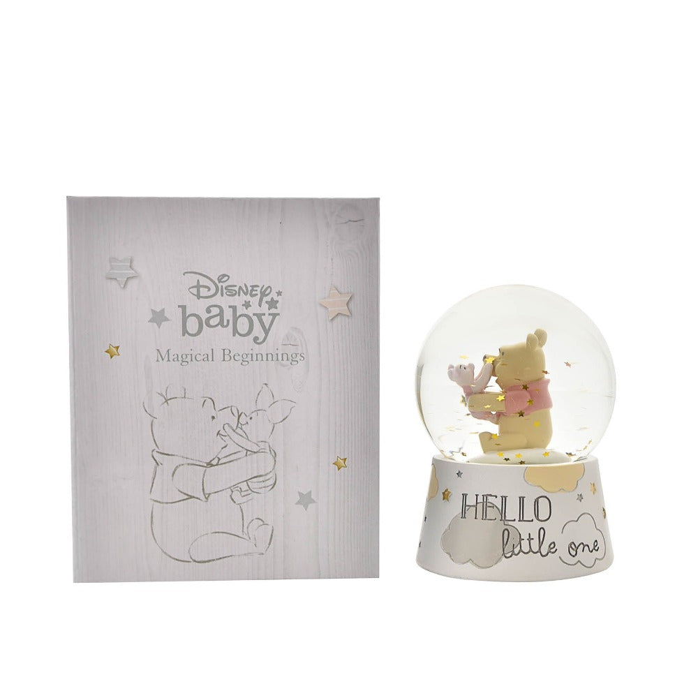 Disney Magical Beginnings Snow Globe Pooh & Piglet   Bring some of AA Milne's timeless magic to their nursery or bedroom with this hand painted and highly collectable Winnie the Pooh and Piglet sequin snow globe. From Disney Magical Beginnings - celebrating the start of the greatest adventure.