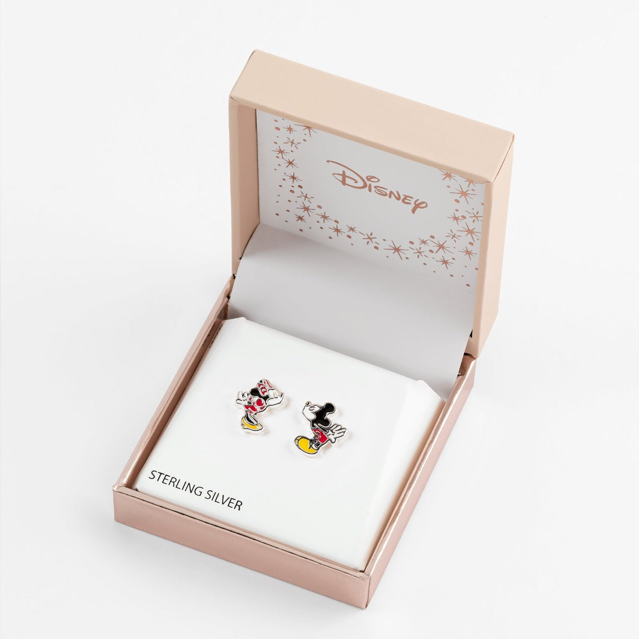 Peers Hardy Disney Mickey and Minnie Mouse Mismatched Stud Earrings  This classic adorable pair has a unique mismatched quality of Mickey and Minnie Mouse Kissing, one in Mickeys shape one in Minnies shape leaning into a kiss and giving a playful twist to this classic accessory.  Trendy and fashionable design, the Disney Mickey & Minnie Mouse kissing famous pose Sterling Silver Stud Earrings add a chic, fun touch to any outfit.