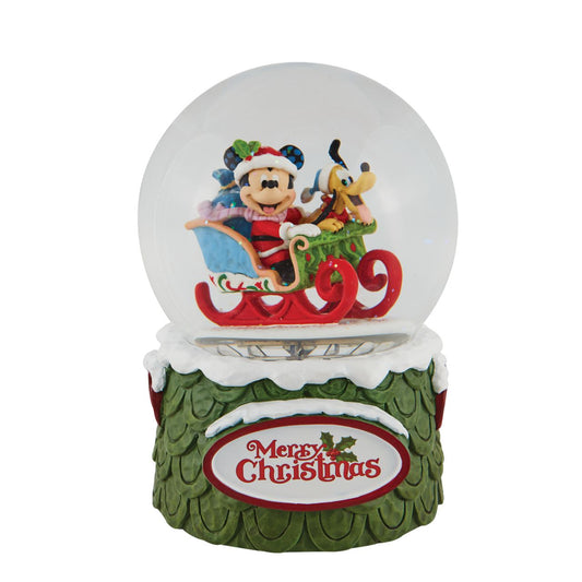 Disney Mickey and Pluto Christmas Waterball  "Laughing All the Way" Make it snow all season long with this exquisitely crafted Disney snow globe by Jim Shore. Mickey plays Santa with his trusty steed, Pluto, riding shotgun.