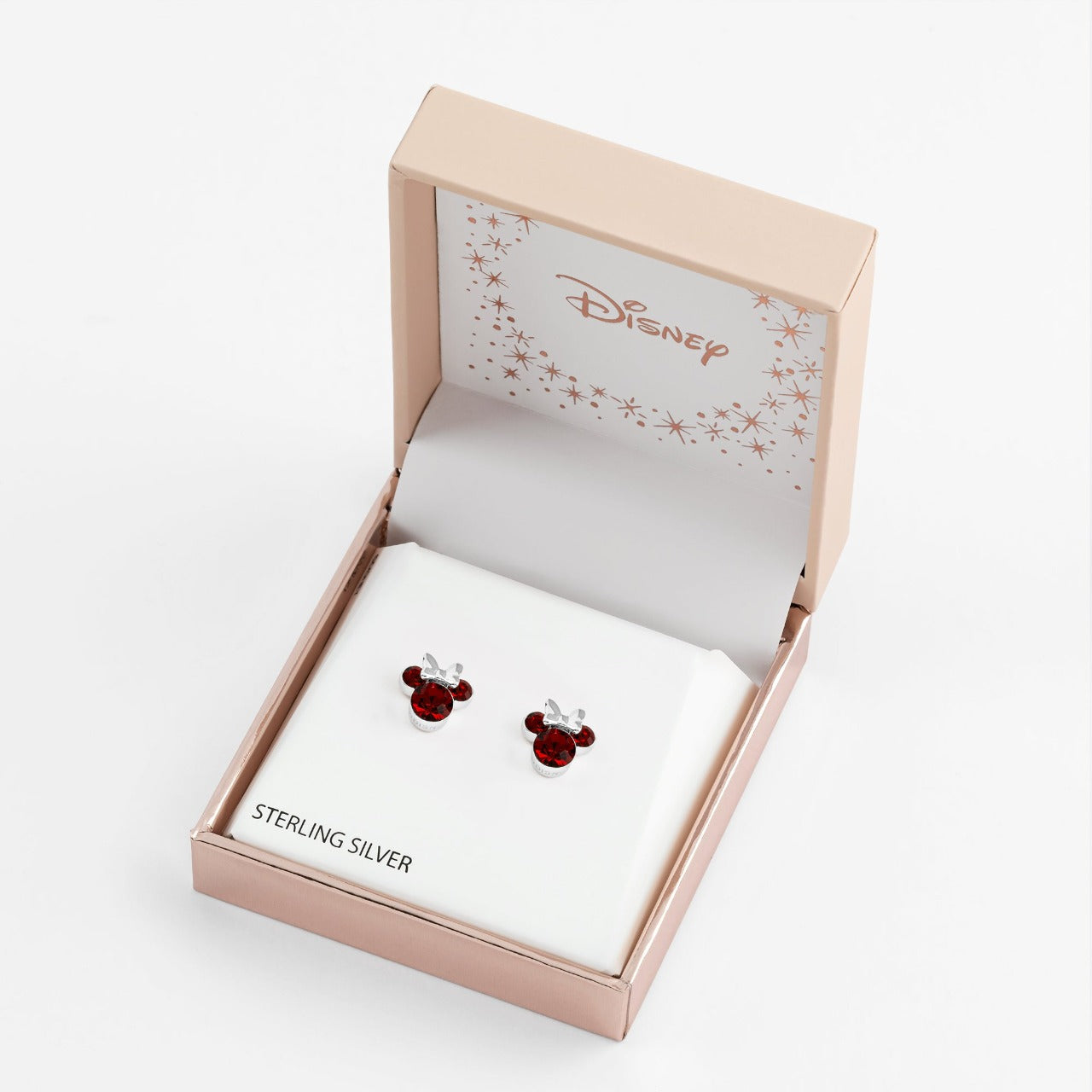 Disney Minnie Mouse Sterling Silver Birthstone Earrings Siam Red  Siam Red January Birthstone  Stunning silver Birthstone earrings form a silhouette of Minnie Mouse with red CZ Crystals adding a feminine touch to the Disney classic piece of Jewellery.  Trendy and fashionable design, the Disney Minnie Mouse silhouette sterling silver earrings add a chic, fun touch to any outfit.