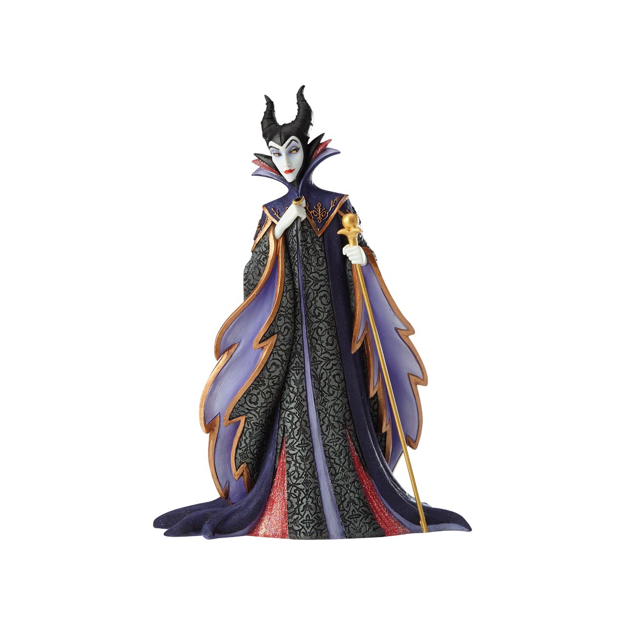 Disney Maleficent Figurine  Maleficent strikes a regal pose in this handcrafted design from the Haute Couture collection, her ominous onyx robes reimagined as a satin gown and feathered, floor-length cape. Ready to rule the runway, the fashionable figure holds a golden scepter.