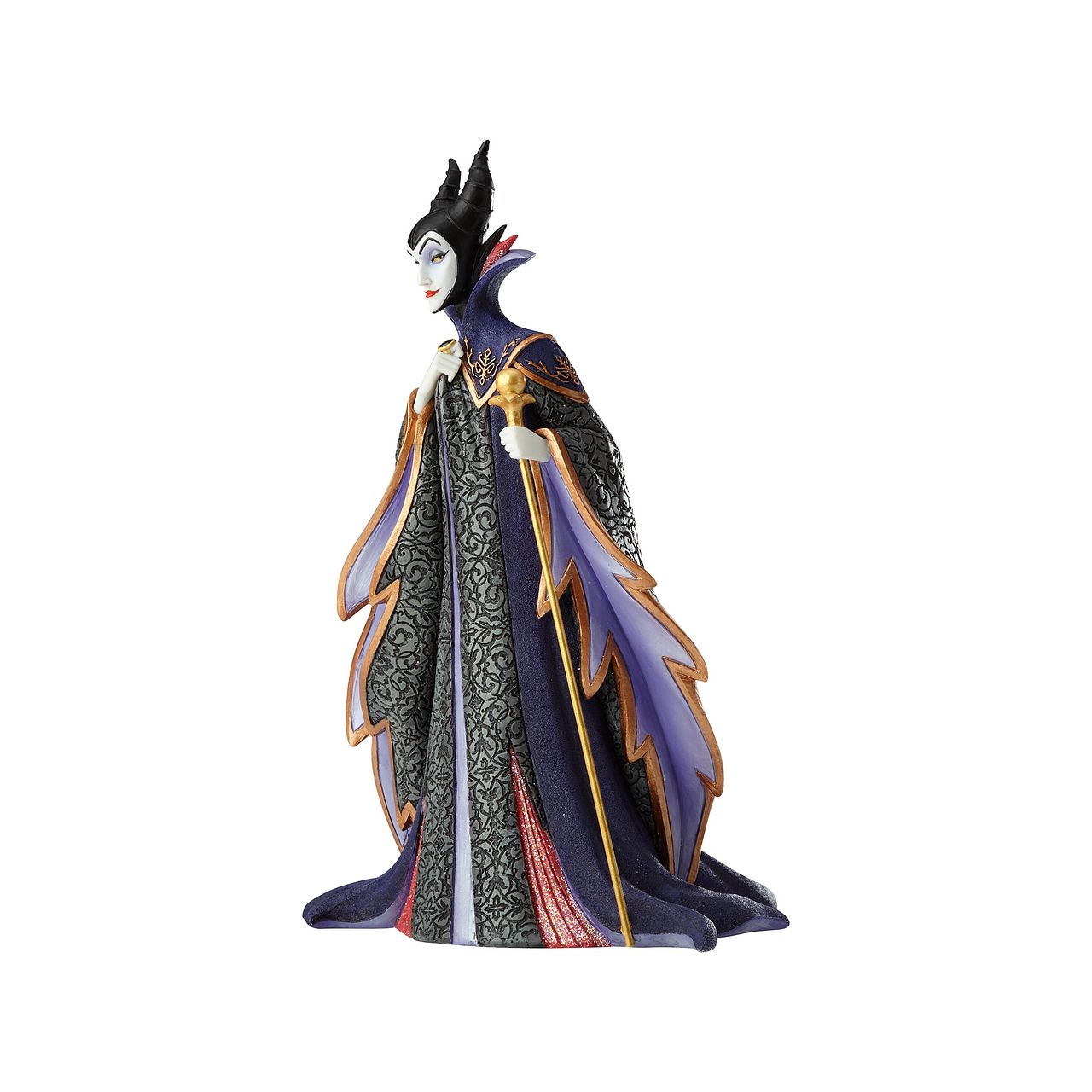 Disney Maleficent Figurine  Maleficent strikes a regal pose in this handcrafted design from the Haute Couture collection, her ominous onyx robes reimagined as a satin gown and feathered, floor-length cape. Ready to rule the runway, the fashionable figure holds a golden scepter.