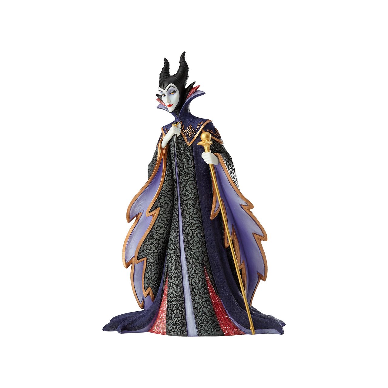 Disney Maleficent Figurine  Maleficent strikes a regal pose in this handcrafted design from the Haute Couture collection, her ominous onyx robes reimagined as a satin gown and feathered, floor-length cape. Ready to rule the runway, the fashionable figure holds a golden scepter.