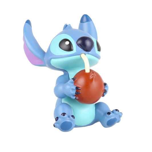 Stitch Coconut Figurine  Why not join Stitch with a refreshing Coconut drink. Each piece is hand painted and slight colour variations are to be expected which makes each piece unique. Supplied in branded gift box with a window. Not a toy or children's product. Intended for adults only.