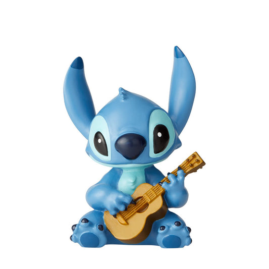Disney Traditions Stitch Guitar Figurine  Here to play you your favourite tune, Lilo's best friend Stitch will turn any frown upside down. With perked ears and a sweet smile, this little guy will help your mind drift away to Hawaiian paradise.