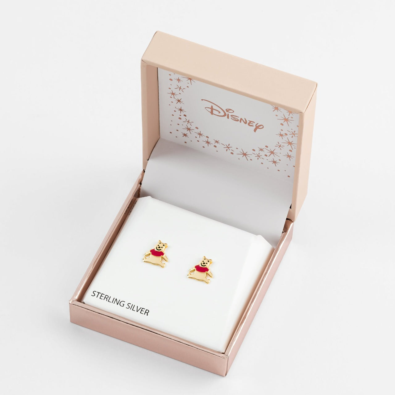 Disney Winnie The Pooh Sterling Silver Earrings  These exquisitely designed Winne the Pooh stud earrings, form a silhouette of Winnie's famous pose adding a feminine touch to the classic piece of jewellery  Trendy and fashionable design, the Disney Winnie The Pooh stud earrings add a chic, fun touch to any outfit.