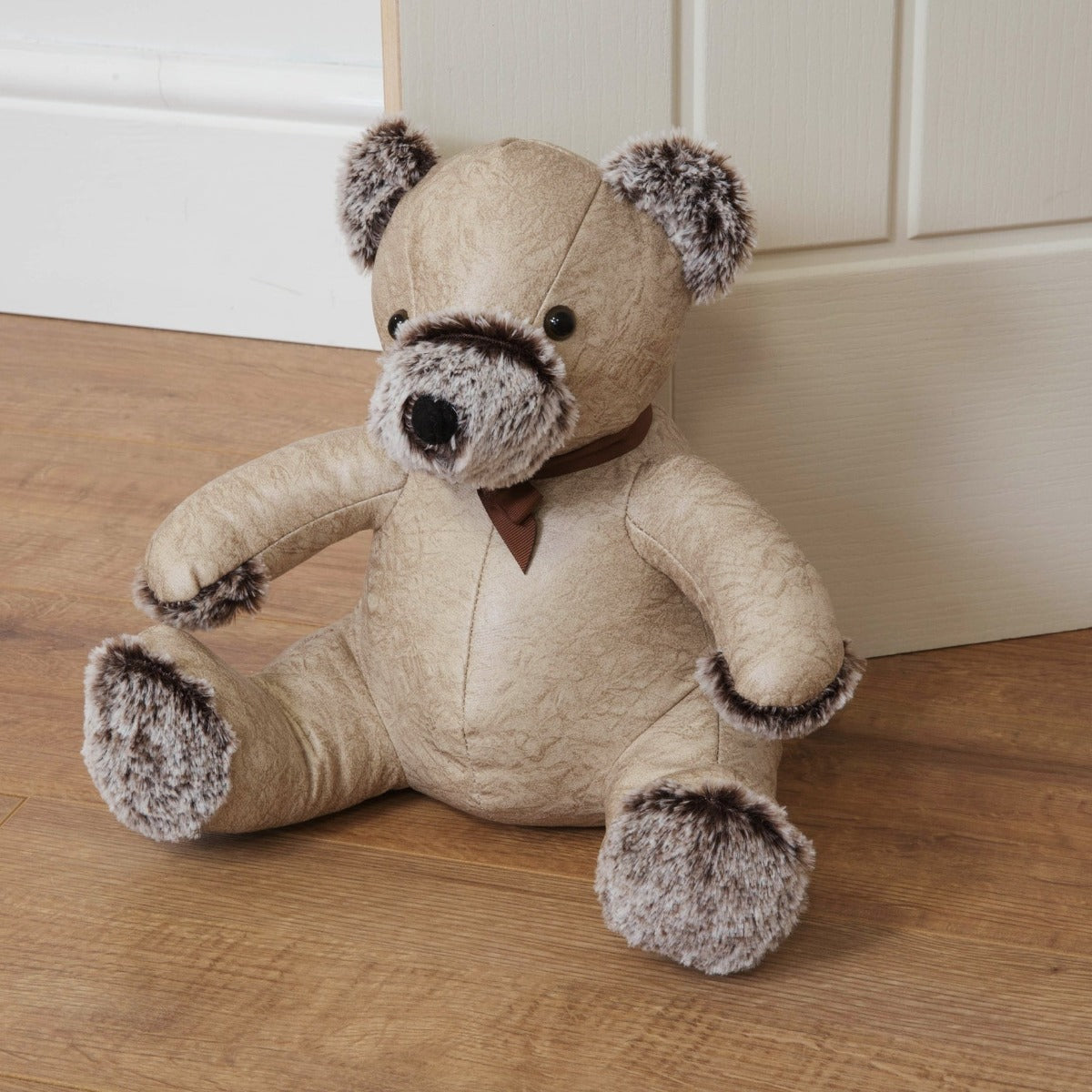 Door Stop - Beige Bear  Bring some warmth and charm to any room with this distressed beige faux leather teddy bear door stop. From the Nature Trail collection by HESTIA® - bring some subtle Spring vitality to your home.