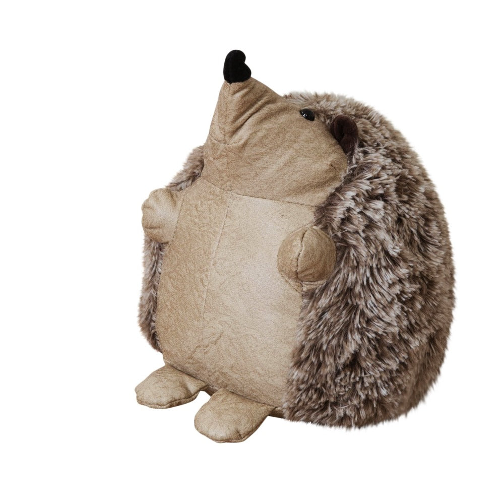 Home Living Door Stopper - Beige Hedgehog  Bring some warmth and charm to any room with this distressed beige faux leather hedgehog door stop. From the Nature Trail collection by HESTIA® - bring some subtle Spring vitality to your home.