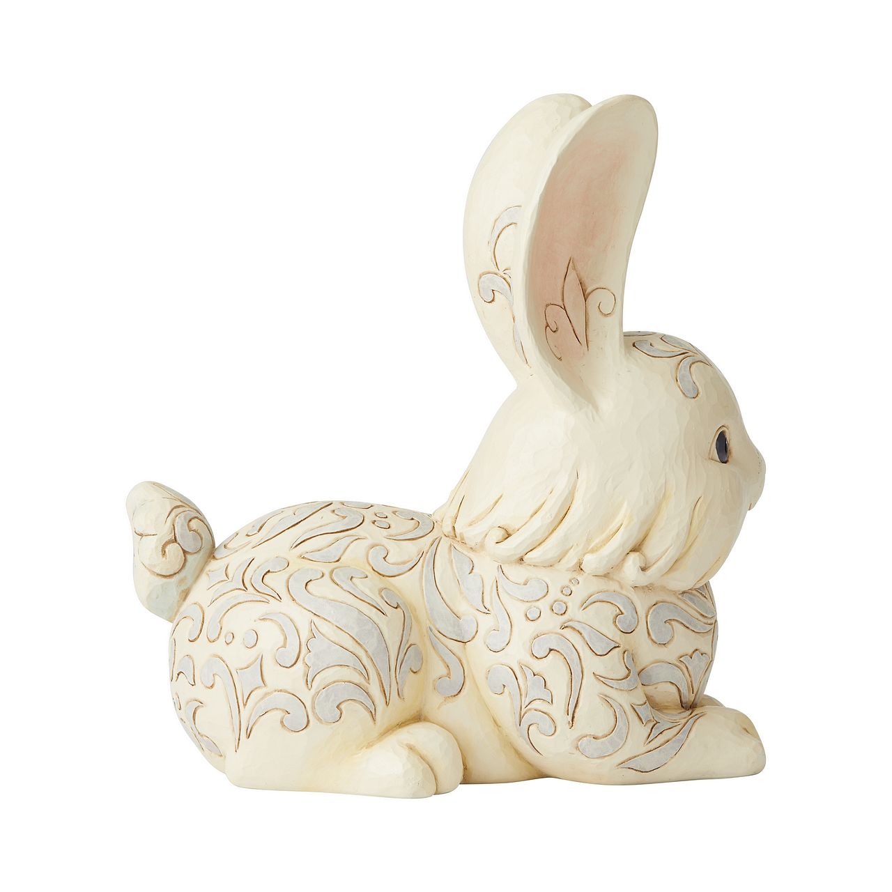 Jim Shore White Woodland Bunny Garden Statue  Decorated with Jim Shore's distinctive folk-art designs, this Bunny Garden Statue is a light-hearted accent to any outdoor setting. Handcrafted with Jim's signature attention to detail, this charming design is specially treated for outside display.