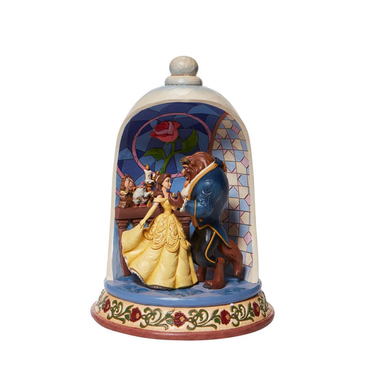 Jim Shore Enchanted Love - Beauty and the Beast Rose Dome Figurine  This Jim Shore hand-painted diorama figurine helps celebrate the 30th anniversary of the legendary romance of Belle and the Beast. Very enthusiastic Lumiere, Cogsworth and Mrs. Potts watch as Belle and the Beast share a moonlight waltz and loving gaze.