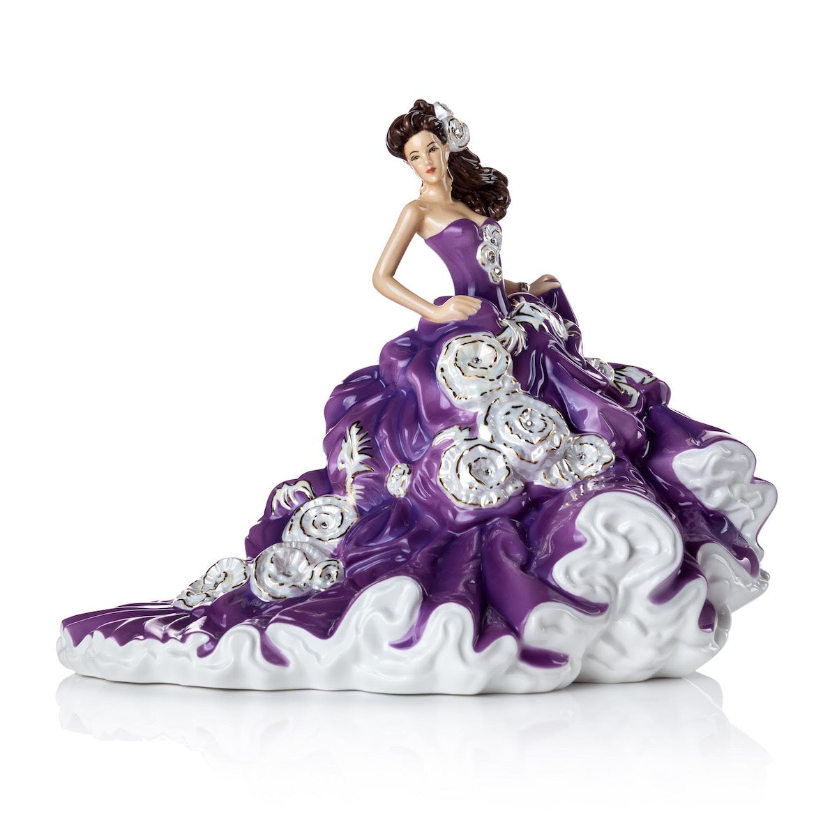 English Ladies Company Amethyst Enchantment NEW 2021  Amethyst Enchantment is our brand new figurine to our English Ladies Co range. Designed and modelled by Valerie Annand, our master painter Dan Smith has created this wonderful colourway. Her rich purple dress is decorated with Mother of Pearl highlights and 24 real Swarowski® crystals, she really is a beauty.