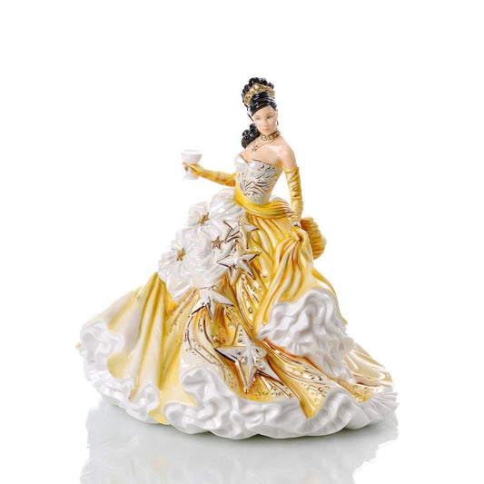 English Ladies Congratulations Gold  Our Congratulations Gold figurine is one of our best sellers from the English Ladies Congratulations Collection. This is an amazing fine bone china figurine, designed by renowned modeller Valerie Annand and Master Painter Dan Smith, for our Congratulations figurines range.