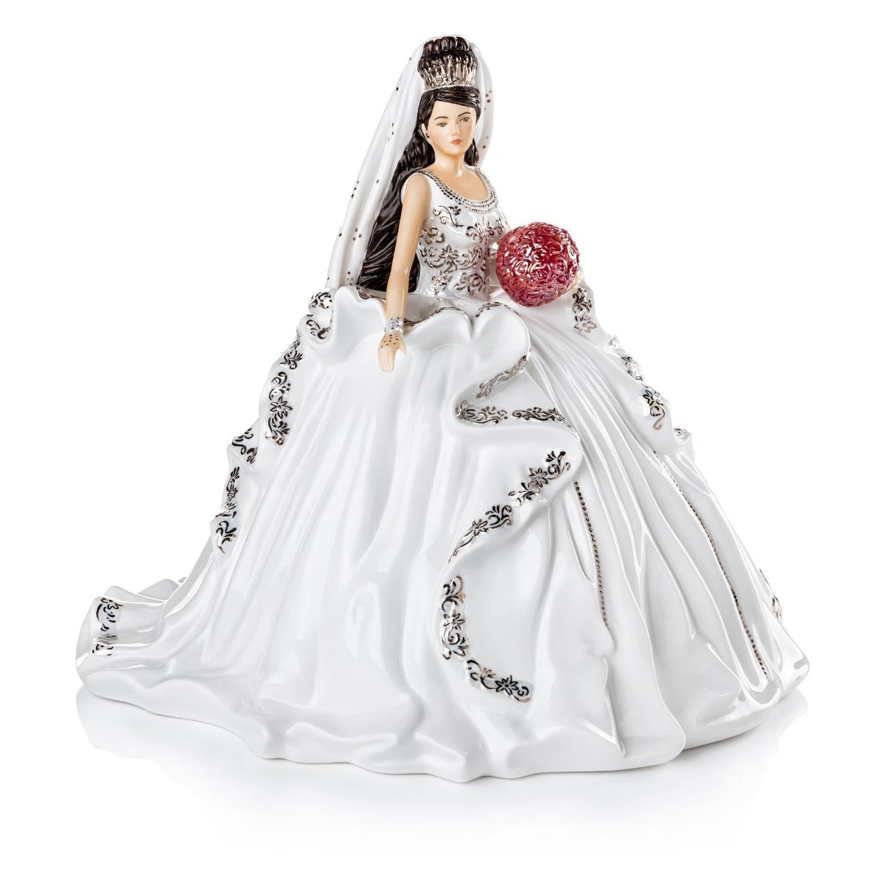 English Ladies Gypsy Affection Brunette  Gypsy Affection figurines are the latest to join the Thelma Madine range here at the English Ladies Co. This figurine is inspired by the stunning work of Thelma Madine and brings to life the style of her dresses in figurine form.