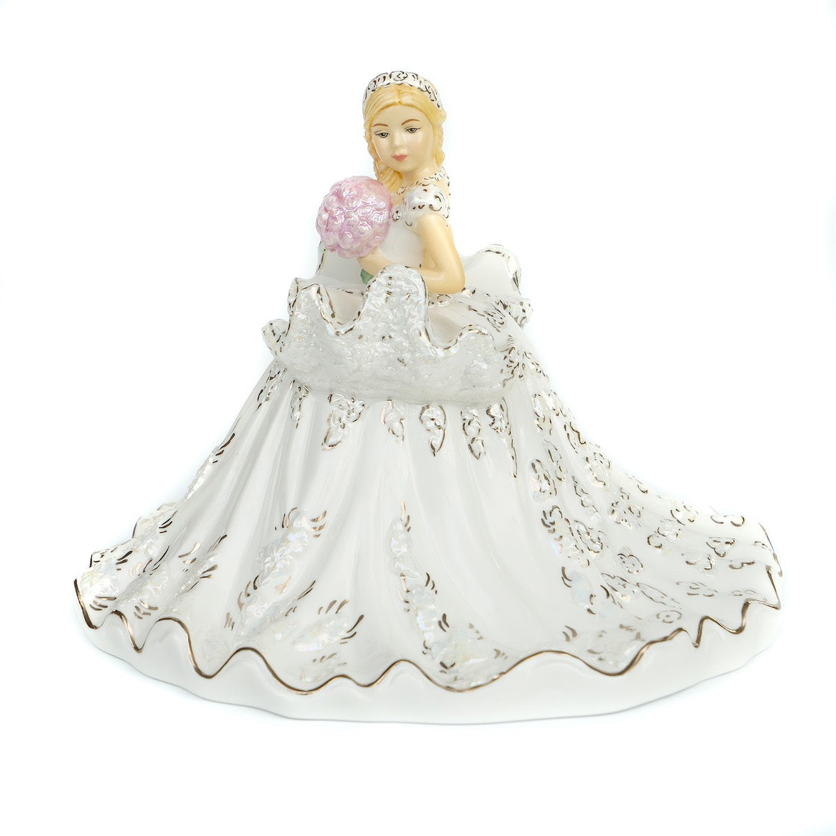 English Ladies Mini Gypsy Elegance Figurine Blonde  Thelma Madine’s striking Gypsy Elengence figurine has been miniaturised in these cute little mini bride figures. Hand made and hand-decorated, each figure shines with real platinum and Mother of pearl lustre. Gift boxed.